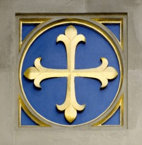 Westminster Abbey's emblem of a cross patonse, known as St Edward's Cross.