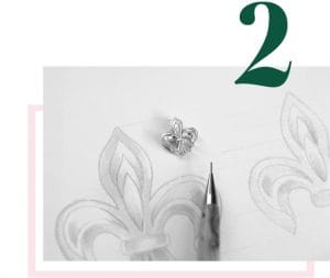 Step 2 of How We Work, showing a sketch of a fleur de lis