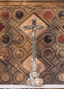 A silver crucifix in Westminster Abbey, with a bronze corpus.