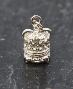 A small silver cushion crown pendant