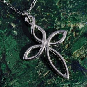 A sterling silver twist cross pendant on a chain