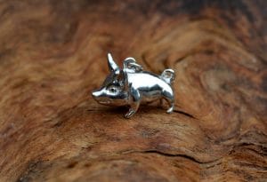 A little silver pig pendant by Mallards.