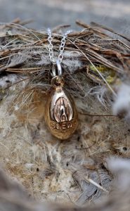 Bronze egg pendant for St Ewe Free Range Eggs