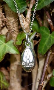 Silver Egg Pendant for St Ewe on a neck chain.
